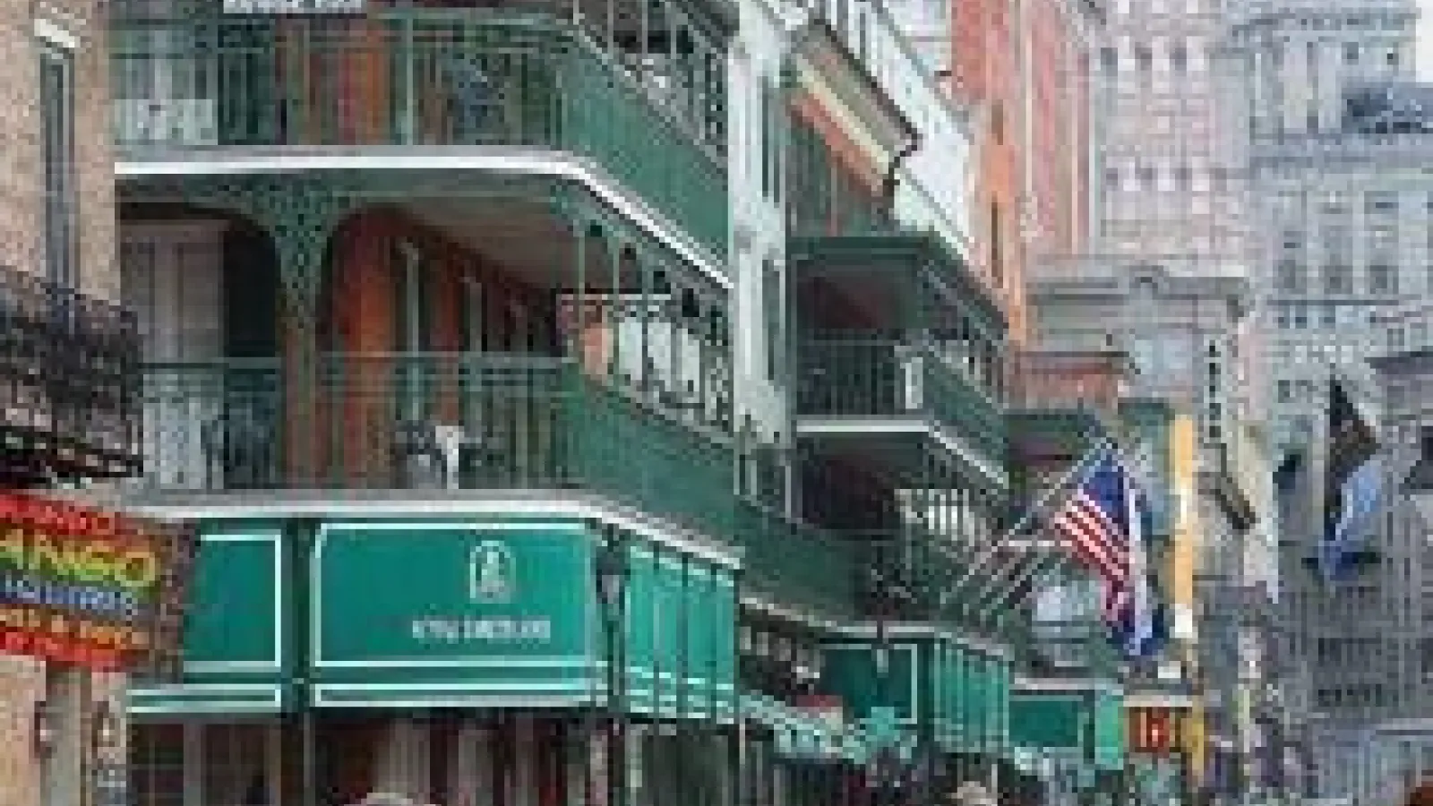 Busy street in New Orleans filled with pedestrians