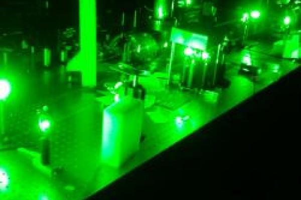 GRAY laser setup illuminated by green laser scatter