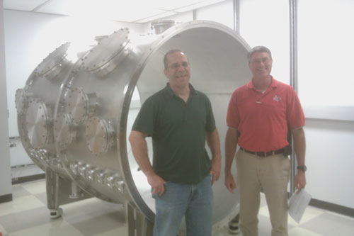 HEDP members standing in front of the new Compressor